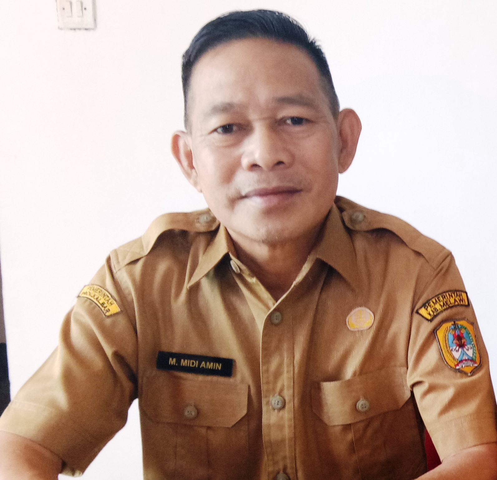 M. Midi Amin