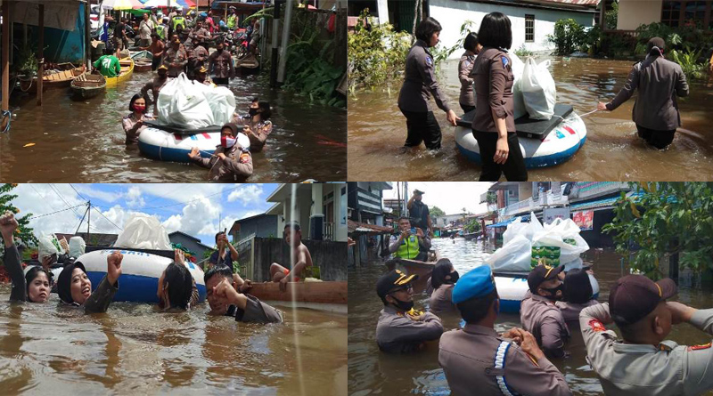 Heroik, Kapolres Melawi dan Polwan Door to Door Bagikan Nasi Kotak dan Mie Instan, Berenang Jangkau Warga. Poto: Humas Polres Melawi

